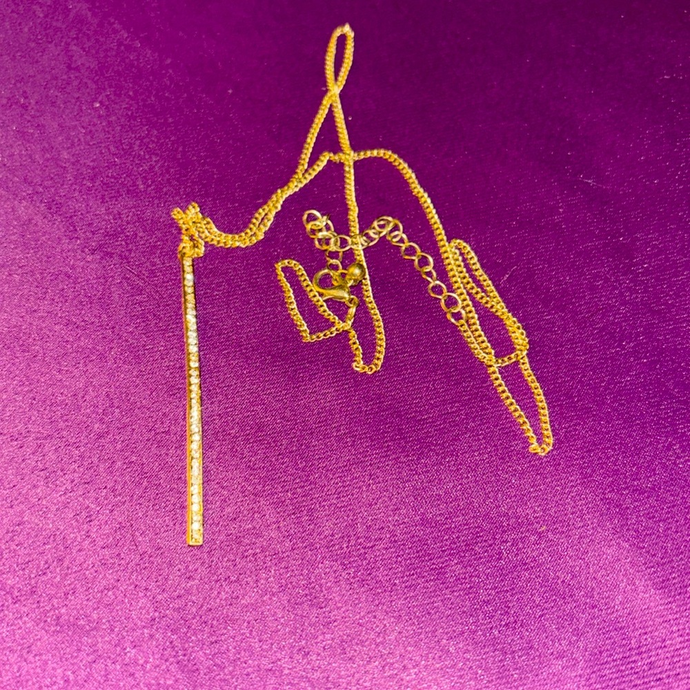 Gold long necklace with diamond looking bar charm
